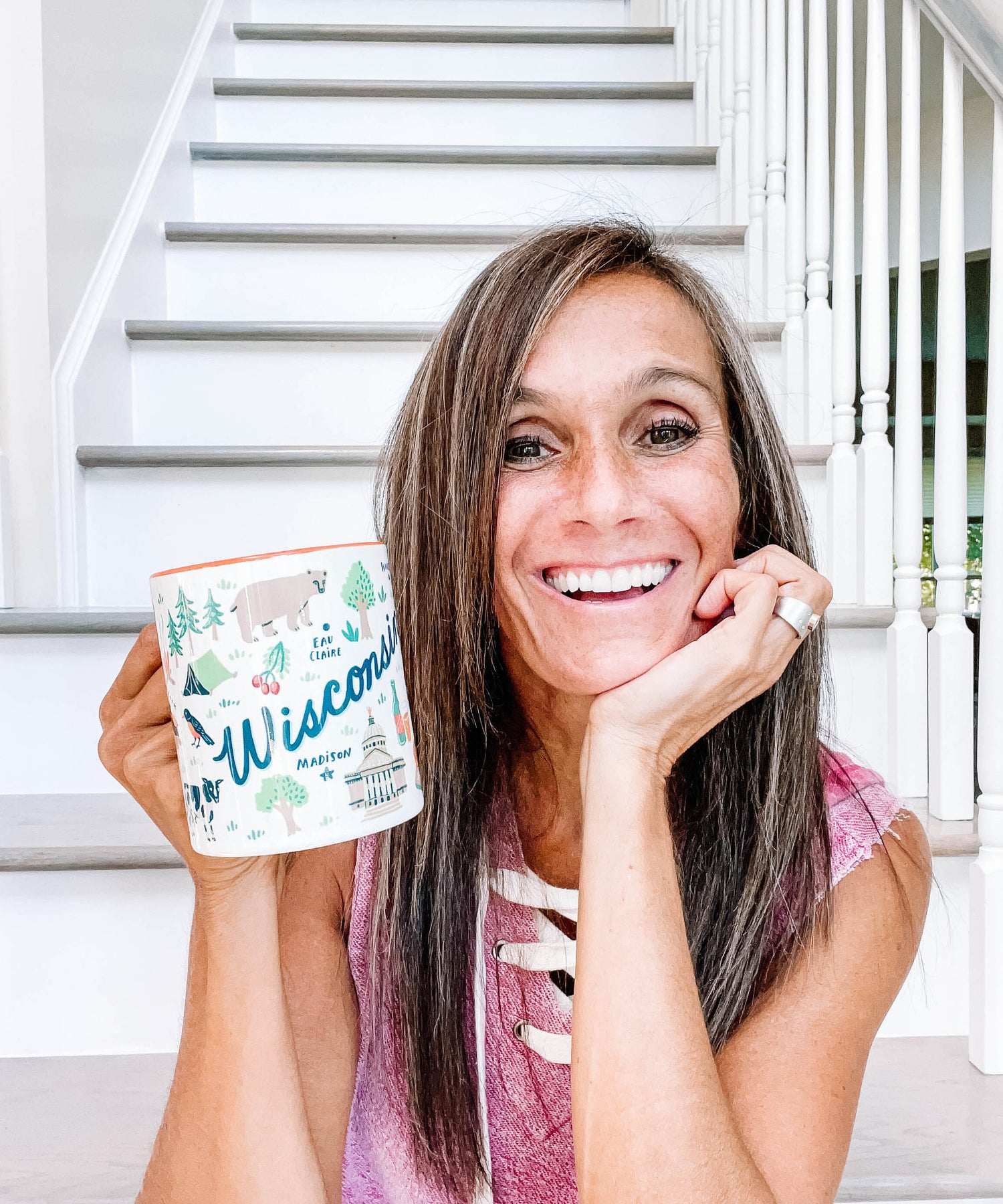 Angela-staehling-drinking-coffee-with-Wisconsin-coffee-cup