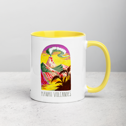 White ceramic coffee mug with yellow handle and inside; has Hawaii Volcanoes National Park illustration by Angela Staehling