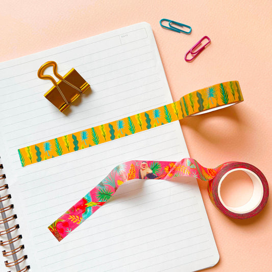 Two rolls of tropical yellow and red washi tale with paperclips